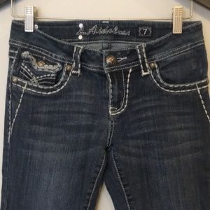 LA Idol dark wash jeans with light blue stitching
